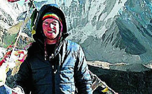 Tim Hentschel suitably rugged up at Kala Patar, which at an altitude of 5800 metres is the best view point for Mount Everest, towering in the background. Tim Hentschel suitably rugged up at Kala Patar, which at an altitude of 5800 metres is the best view point for Mount Everest, towering in the background.