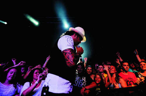 Michael Franti enthralled audiences with an energetic performance at the Mojo tent on Saturday night. Michael Franti enthralled audiences with an energetic performance at the Mojo tent on Saturday night.