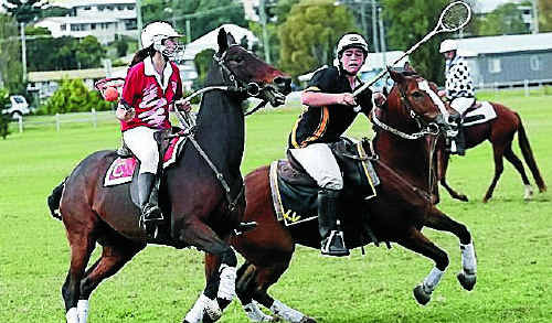 April Lamb, Cunningham club, works to get way from the defence of a Lockyer Valley player at the Killarney Polocrosse Carnival last weekend. April Lamb, Cunningham club, works to get way from the defence of a Lockyer Valley player at the Killarney Polocrosse Carnival last weekend.