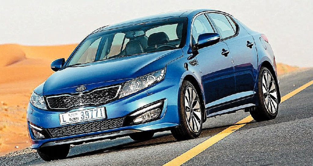 While the steering is light, the Kia Optima is a comfortable cruiser. While the steering is light, the Kia Optima is a comfortable cruiser.