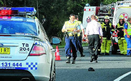 Police investigate the death of a pedestrian on the Pacific Highway. Police investigate the death of a pedestrian on the Pacific Highway.