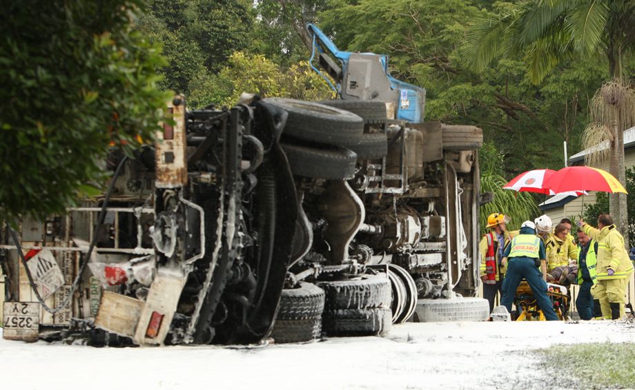 A truck overturned at the bottom of Landsborough-Maleny road at the Gympie street roundabout. A truck overturned at the bottom of Landsborough-Maleny road at the Gympie street roundabout.