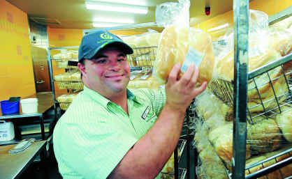 David Langler in the bakery section at Woolworths where he’s worked for 10 years.