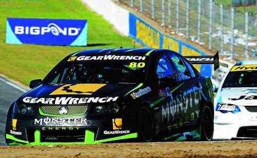 Former Byron Bay driver Andrew Thompson pulls away from David Russell in the 2011 Fujitsu V8 Supercar Series at Barbagallo Raceway in Perth last weekend. Former Byron Bay driver Andrew Thompson pulls away from David Russell in the 2011 Fujitsu V8 Supercar Series at Barbagallo Raceway in Perth last weekend.