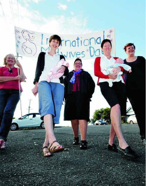 Midwives marching for International Midwives’ Day Veronica Hall, Dawn Shalom, Kathy Preston, Janet Coll and Tricia Russell. Midwives marching for International Midwives’ Day Veronica Hall, Dawn Shalom, Kathy Preston, Janet Coll and Tricia Russell.