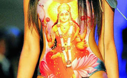 Swimwear designed by Byron Bay’s Lisa Blue fashion house, featuring Hindu icons, has caused outrage and protests in India. Swimwear designed by Byron Bay’s Lisa Blue fashion house, featuring Hindu icons, has caused outrage and protests in India.