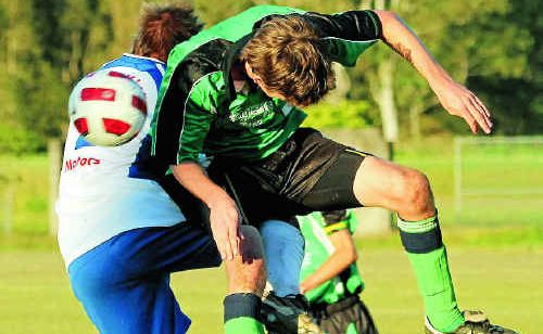 Malcean Bobcats and Northern Storm players clash during their North Coast Football match at Maclean on Saturday. Malcean Bobcats and Northern Storm players clash during their North Coast Football match at Maclean on Saturday.