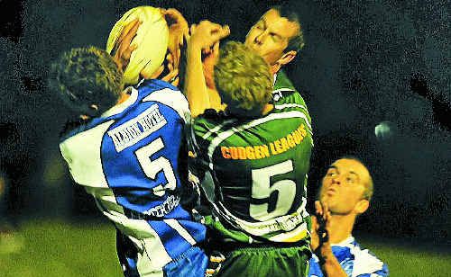 Ghosts’ number 5, Daniel Lollback, goes up against the opposition during the match against Cudgen on Saturday night at Frank McGuren fields. Ghosts’ number 5, Daniel Lollback, goes up against the opposition during the match against Cudgen on Saturday night at Frank McGuren fields.