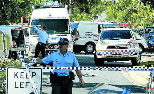 THIN BLUE LINE: Police cordon off the area where the bodies were found. Photos: Scott Powick TWE160511police9 THIN BLUE LINE: Police cordon off the area where the bodies were found. Photos: Scott Powick TWE160511police9