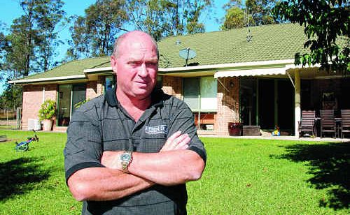 Simon Lynch can demolish this home, purchased for the Traveston Crossing dam, but the government will not allow his family to live there. Simon Lynch can demolish this home, purchased for the Traveston Crossing dam, but the government will not allow his family to live there.