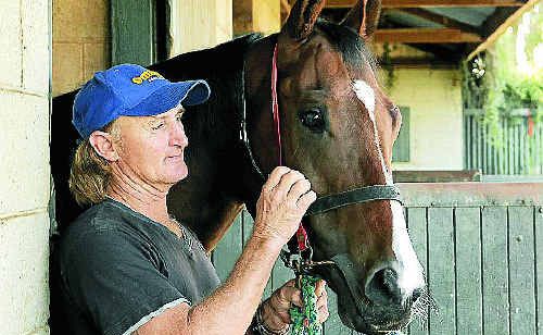 Stable foreman Allan Miller and Azzaland who is facing an uncertain future. Stable foreman Allan Miller and Azzaland who is facing an uncertain future.