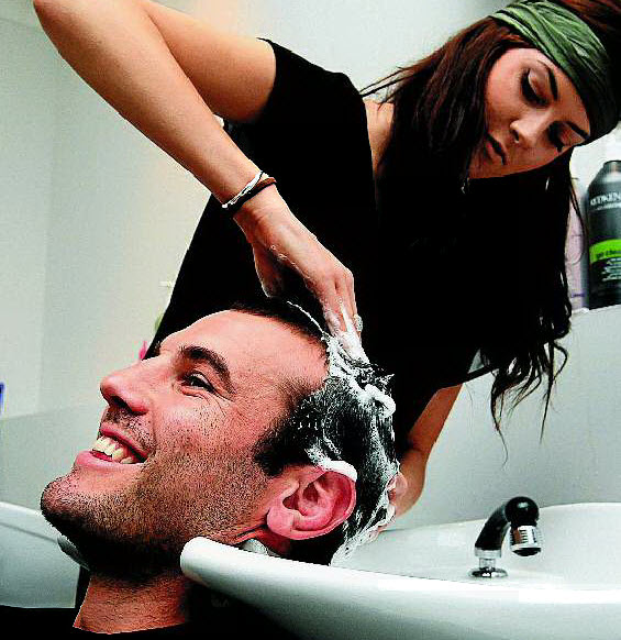 Emma Wilson beautifies Titans player Anthony Laffranchi. Emma Wilson beautifies Titans player Anthony Laffranchi.