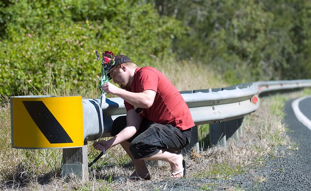 Casino father Ashley Rankin places flowers near the spot at Piora where five-year-old Kyla Rogers and her father were found dead in a car. Casino father Ashley Rankin places flowers near the spot at Piora where five-year-old Kyla Rogers and her father were found dead in a car.