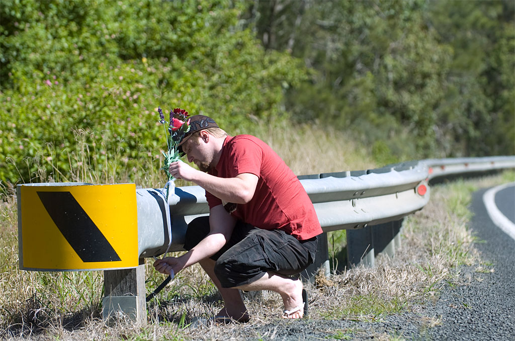 Casino father Ashley Rankin places flowers near the spot at Piora where five-year-old Kyla Rogers and her father were found dead in a car. Casino father Ashley Rankin places flowers near the spot at Piora where five-year-old Kyla Rogers and her father were found dead in a car.