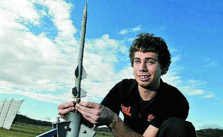 David Groves prepares to launch his rocket at the Rangeville Space Pilots club rocket launch.