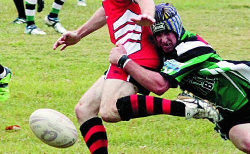 The Stags' Josh Ryan takes down a Palmwoods player in May. The Stags' Josh Ryan takes down a Palmwoods player in May.