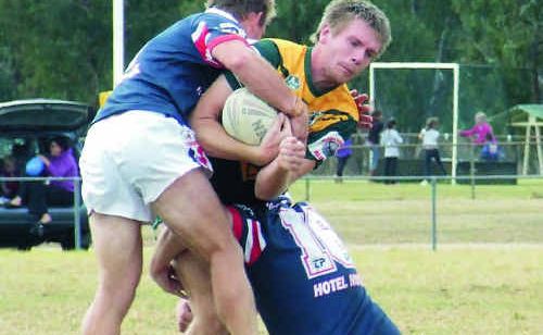 Wattles reserve grade lock Lauchlan Hoey is halted by the Warwick defence in the fixture at Father Ranger Oval. Photo Glyn Rees Wattles reserve grade lock Lauchlan Hoey is halted by the Warwick defence in the fixture at Father Ranger Oval. Photo Glyn Rees