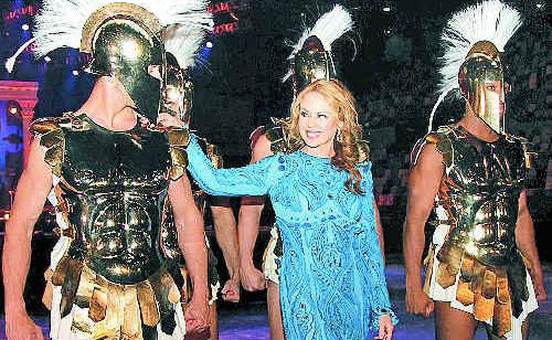 Pop princess Kylie Minogue checks out the male muscle before her shows tonight and tomorrow night at the Brisbane Entertainment Centre. Pop princess Kylie Minogue checks out the male muscle before her shows tonight and tomorrow night at the Brisbane Entertainment Centre.