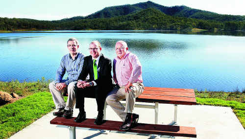 Queensland Water and Infrastructure CEO Frankie Carroll (left) and chairman Bob McCarthy (right) with Treasurer Andrew Queensland Water and Infrastructure CEO Frankie Carroll (left) and chairman Bob McCarthy (right) with Treasurer Andrew