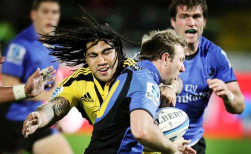 Ipswich product James Stannard gives Ma’a Nonu “the don’t argue” before sending Ben McCalman (in support) over to score for the Western Force against the Hurricanes in their recent Super 15 clash. Photo: Getty Images Ipswich product James Stannard gives Ma’a Nonu “the don’t argue” before sending Ben McCalman (in support) over to score for the Western Force against the Hurricanes in their recent Super 15 clash. Photo: Getty Images