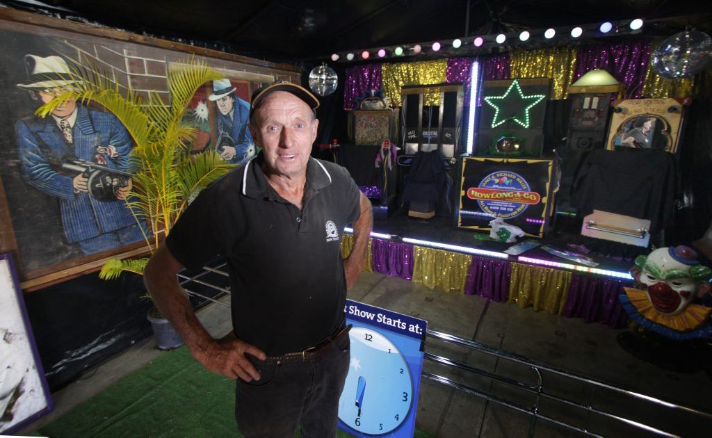 Richard Miller stands in front of his stage where throughout the show he will perform acts and display decades of carnival memorabilia. Richard Miller stands in front of his stage where throughout the show he will perform acts and display decades of carnival memorabilia.