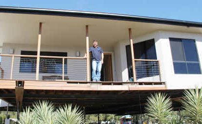 Jim Fabish stands out front of his dream home on Gray St, which he raised 2.7m following the December-January floods. Jim Fabish stands out front of his dream home on Gray St, which he raised 2.7m following the December-January floods.