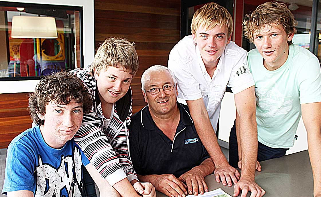 LUCKY TO BE FOUND: The five bushwalkers Scott, Michael, Harold, Cam and Caleb with an image of where they were found on Monday. LUCKY TO BE FOUND: The five bushwalkers Scott, Michael, Harold, Cam and Caleb with an image of where they were found on Monday.