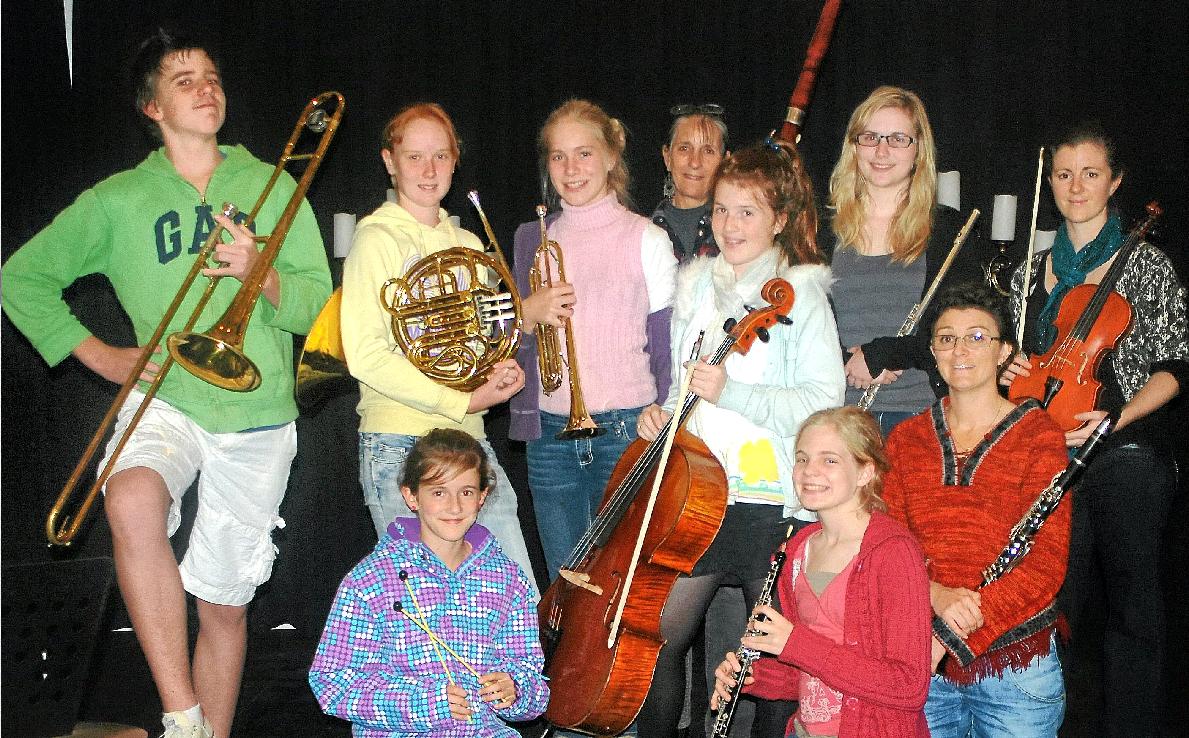 Members of the Cooloola Community Orchestra are ready to entertain at Memorial Park this Sunday from 12 noon. 