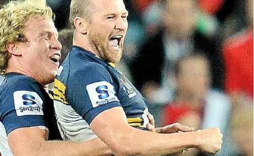 Brumbies players Matt Giteau (right) and Henry Vanderglas react following the Brumbies’ win against the Reds at Suncorp. Brumbies players Matt Giteau (right) and Henry Vanderglas react following the Brumbies’ win against the Reds at Suncorp.