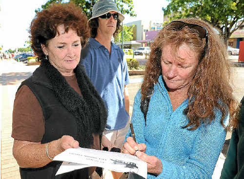 Jenny Ridley and Tammy McTaggart with the petition.
