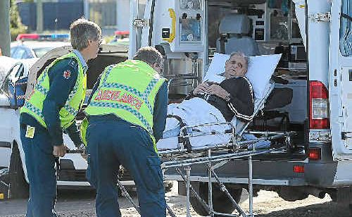 A man is treated by paramedics following a crash at the corner of Beach Rd and Islander Rd. A man is treated by paramedics following a crash at the corner of Beach Rd and Islander Rd.