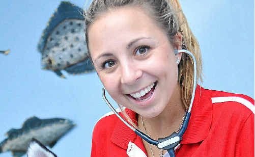 A Day In The Life Of....a Vet: The Observer reporter, Emily Blatchford learns how to perform a health check on "Duke".