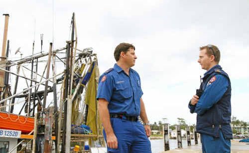 Yamba Paramedics Gavin Bridges (left) and Adam Jarrett debrief after taking 13-year-old Drew Hall to hospital following a collision with a whale near Brooms Head. Yamba Paramedics Gavin Bridges (left) and Adam Jarrett debrief after taking 13-year-old Drew Hall to hospital following a collision with a whale near Brooms Head.