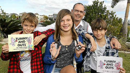 Pelican Waters Doctor Nick Dreyer and his 11-year-old daughter Jessica have penned a book on health for children called Tummy and Guts. Nine-year-old twins Niclas and Dante also helped with the project. Pelican Waters Doctor Nick Dreyer and his 11-year-old daughter Jessica have penned a book on health for children called Tummy and Guts. Nine-year-old twins Niclas and Dante also helped with the project.