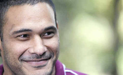 Justin Hodges is all smiles at the Maroons camp at the Hyatt Coolum yesterday. Justin Hodges is all smiles at the Maroons camp at the Hyatt Coolum yesterday.
