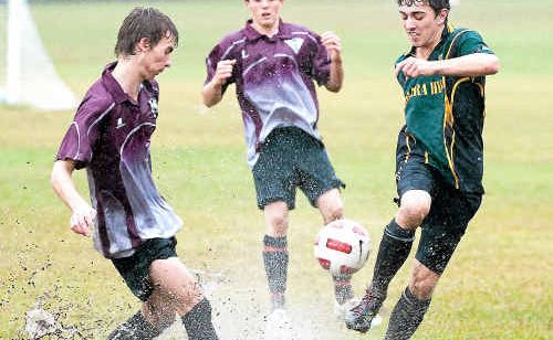 Pools of water were an unexpected hazard during yesterday’s knockout schoolboy football match between Orara and Alstonville high schools.