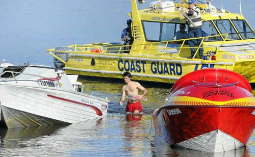 The Ballina coast guard, Ballina Surf Live Saving Club inflatable and Ballina marine jetboat joined forces to rescue two fishermen after their boat capsised crossing the Ballina bar. The Ballina coast guard, Ballina Surf Live Saving Club inflatable and Ballina marine jetboat joined forces to rescue two fishermen after their boat capsised crossing the Ballina bar.