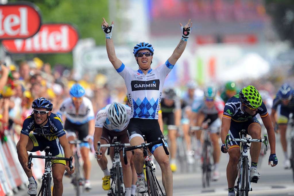 Garmin-CervElo’s Tyler Farrar raises his arms in glory.