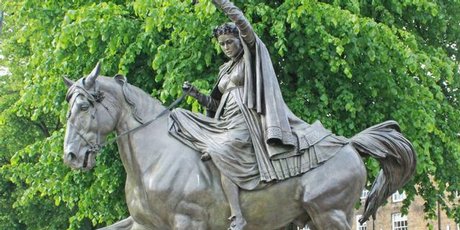 Statue of a fine lady upon a white horse at Banbury Cross, Oxfordshire. Statue of a fine lady upon a white horse at Banbury Cross, Oxfordshire.