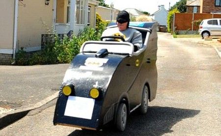 Great grandfather Brian Vannlooks of Evesham, Worcestershire, UK, has turned his electric mobility scooter into a homemade Batmobile. Great grandfather Brian Vannlooks of Evesham, Worcestershire, UK, has turned his electric mobility scooter into a homemade Batmobile.