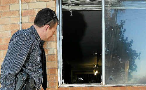 A detective looks into the house where a suspected speed lab was found yesterday. A detective looks into the house where a suspected speed lab was found yesterday.