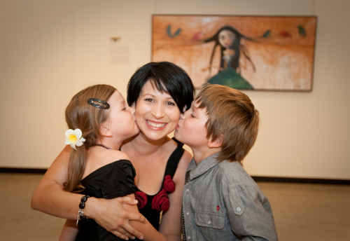 Mum and artist Melanie Jai with son Miller, who has autism spectrum disorder, and daughter India at the opening of her exhibition.