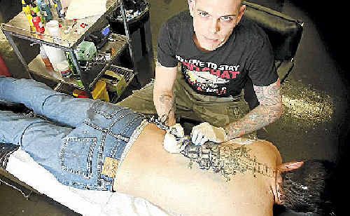 Ultimate Image Tattoo tattooist Matty Tredgold doing a cover-up tattoo. Ultimate Image Tattoo tattooist Matty Tredgold doing a cover-up tattoo.