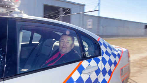 Peace activist Bryan Law being taken away in a police car from Rockhampton Airport after he damaged an Australian helicopter. Peace activist Bryan Law being taken away in a police car from Rockhampton Airport after he damaged an Australian helicopter.