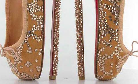 Christian Louboutin has created a crazy eight-inch heel shoe in the name of charity. As part of the English National Ballet’s The Summer Party auction, the designer created these insane Swan Lake style heels. Christian Louboutin has created a crazy eight-inch heel shoe in the name of charity. As part of the English National Ballet’s The Summer Party auction, the designer created these insane Swan Lake style heels.