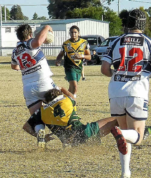 Wattles centre Justin Van Der Poel sends the grass flying as he grounds Brothers lock Ricki Davies.
Wattles centre Justin Van Der Poel sends the grass flying as he grounds Brothers lock Ricki Davies.