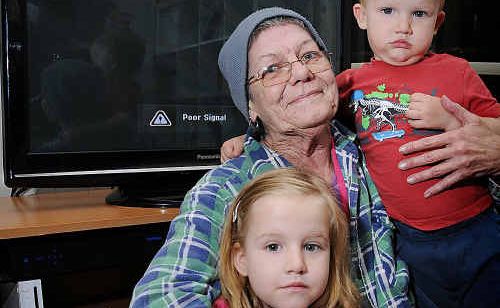 Helen Forrest and grandchildren Ruby and Lucas Smith are sick of getting bad television reception or none at all at their Kandanga home.