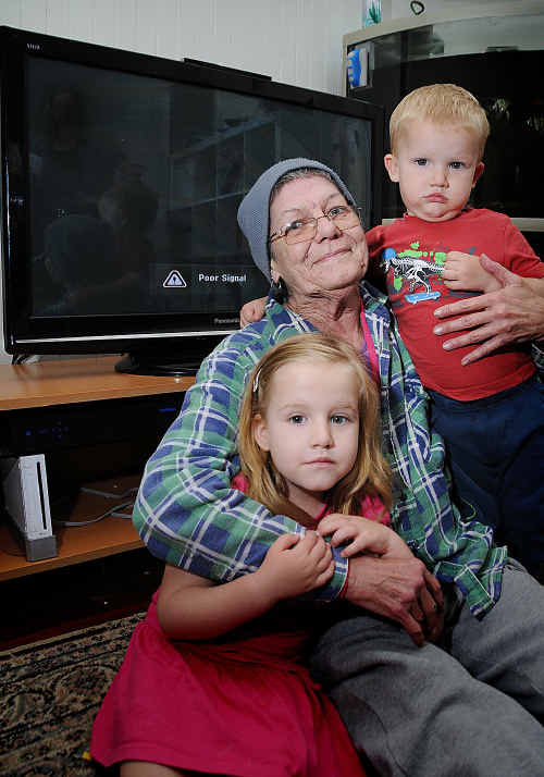 Helen Forrest and grandchildren Ruby and Lucas Smith are sick of getting bad television reception or none at all at their Kandanga home.