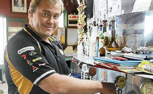 Old Railway Hotel publican Gavin Butlin pours an icy cold glass of XXXX Gold in preparation for International Beer Day today. Old Railway Hotel publican Gavin Butlin pours an icy cold glass of XXXX Gold in preparation for International Beer Day today.