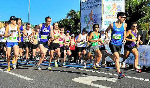 Competitors in the 15km leg of the Cane2Coral fun run take their first paces towards their end destination of Bargara. Competitors in the 15km leg of the Cane2Coral fun run take their first paces towards their end destination of Bargara.